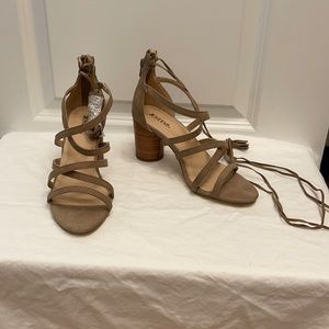 Nude colored suede strapped heels